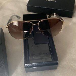 Brand new Prada sunglasses.